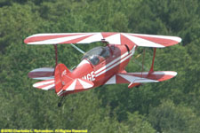 small biplane taking off